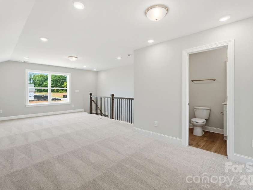 3057 Constitution Lane, Gastonia, NC 28056.  MLS# CAR4359289, YatesRealty ID 19663. Upper-level loft