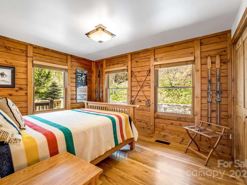 2399 El Miner Drive, Mars Hill, NC 28754.  MLS# CAR4259953, YatesRealty ID 19670. Rest up in the ski bedroom – a cozy retreat where you can recharge for the next day on the slopes.
