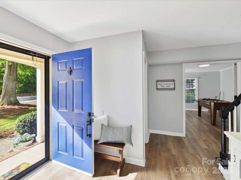 2315 Lawton Bluff Road, Charlotte, NC 28226.  MLS# CAR4255535, YatesRealty ID 19671. A lovely storm door at the entry brings in wonderful light!