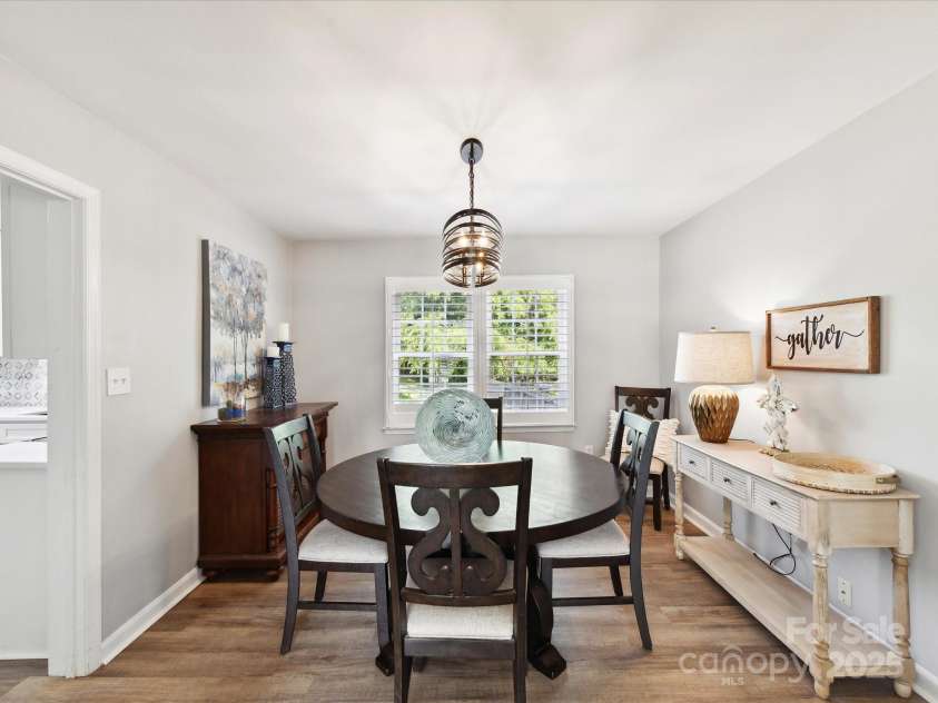 2315 Lawton Bluff Road, Charlotte, NC 28226.  MLS# CAR4255535, YatesRealty ID 19671. Dining room with an updated light fixture