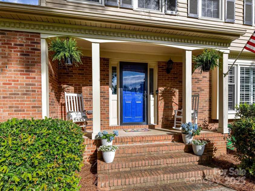 2315 Lawton Bluff Road, Charlotte, NC 28226.  MLS# CAR4255535, YatesRealty ID 19671. Rocking chair front porch greets you!