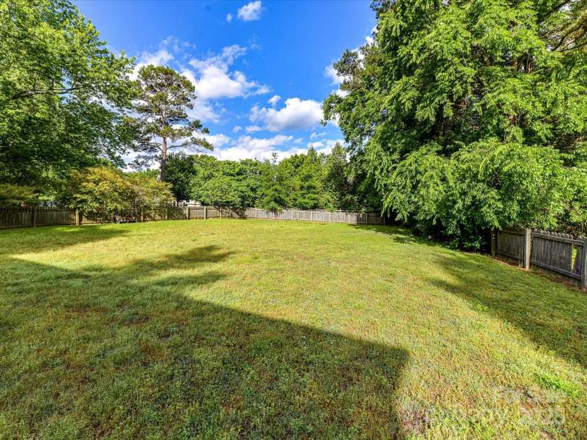 2315 Lawton Bluff Road, Charlotte, NC 28226.  MLS# CAR4255535, YatesRealty ID 19671. So much green space in the backyard!