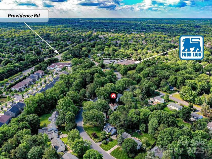 2315 Lawton Bluff Road, Charlotte, NC 28226.  MLS# CAR4255535, YatesRealty ID 19671. The home has such a convenient location to a Food Lion right down the road and nearby Arboretum that has a lot of dining and shopping!