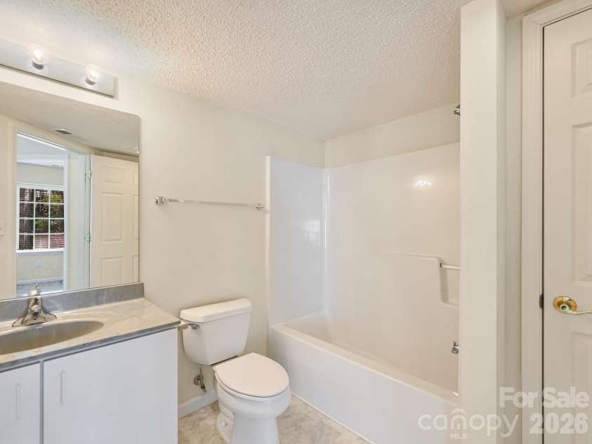 72 Creeks End Circle, Mills River, NC 28759.  MLS# CAR4365753, YatesRealty ID 19672. Downstairs bath with linen closet