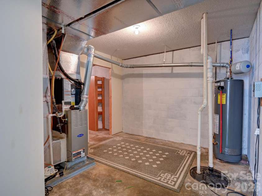 72 Creeks End Circle, Mills River, NC 28759.  MLS# CAR4365753, YatesRealty ID 19672. Downstairs storage room