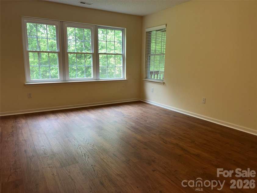 72 Creeks End Circle, Mills River, NC 28759.  MLS# CAR4365753, YatesRealty ID 19672. Upstairs primary bedroom with new floors