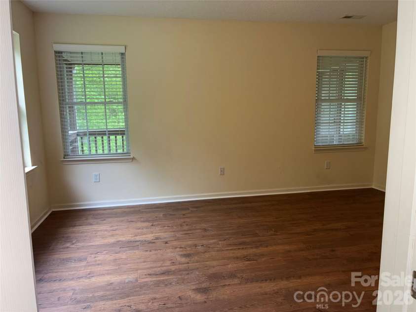 72 Creeks End Circle, Mills River, NC 28759.  MLS# CAR4365753, YatesRealty ID 19672. Upstairs primary bedroom with new floors