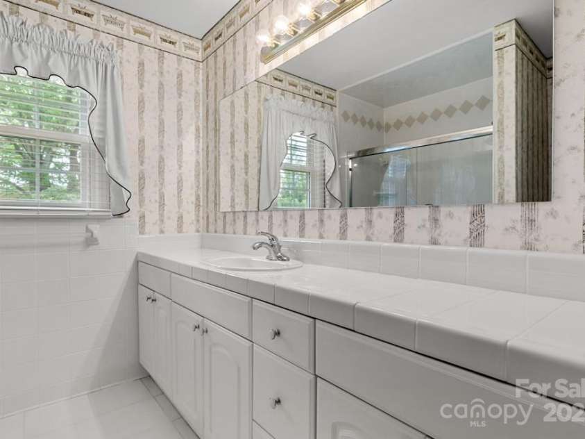 12117 Idlewild Road, Matthews, NC 28105.  MLS# CAR4255082, YatesRealty ID 19676. 