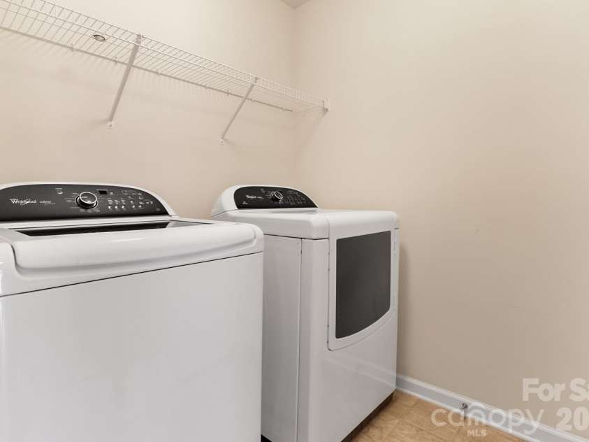 3525 Hornets Nest Way, Charlotte, NC 28208.  MLS# CAR4334370, YatesRealty ID 1968. Laundry room outside of primary bedroom 