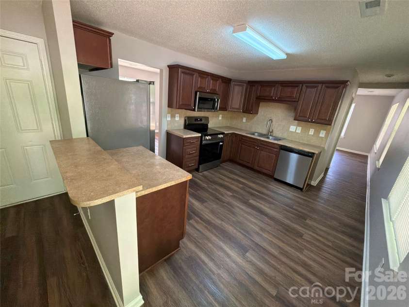 6017 Black Bear Court, Charlotte, NC 28214.  MLS# CAR4371851, YatesRealty ID 19680. 