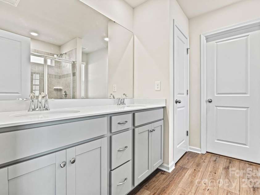 223 Haddonsfield Drive, Mooresville, NC 28115.  MLS# CAR4296062, YatesRealty ID 19693. Double sinks in primary bathroom