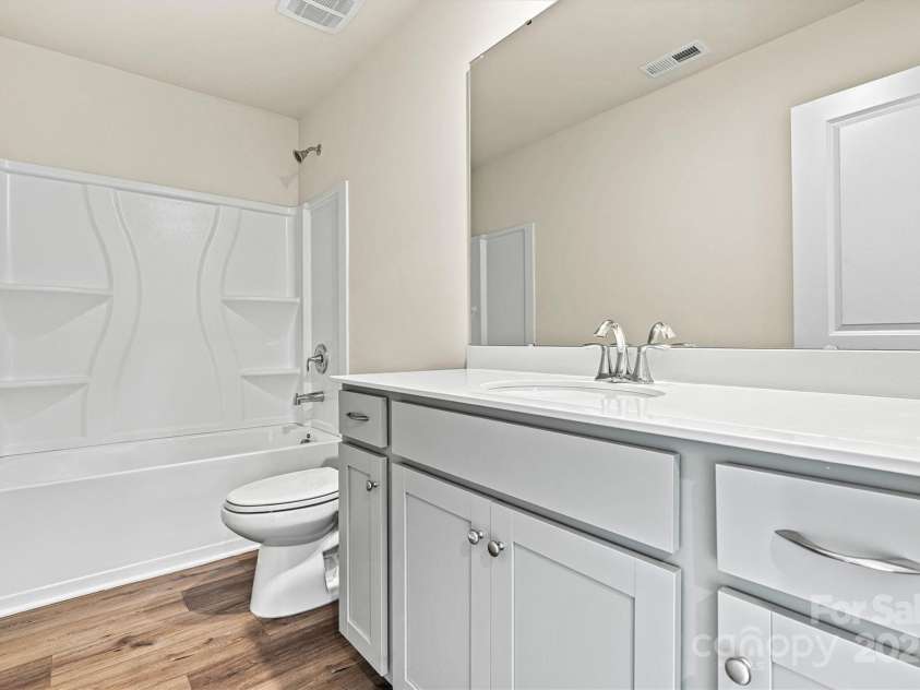 223 Haddonsfield Drive, Mooresville, NC 28115.  MLS# CAR4296062, YatesRealty ID 19693. Guest bathroom w/tub