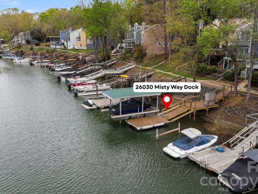 26030 Misty Way Drive, Tega Cay, SC 29708.  MLS# CAR4362203, YatesRealty ID 19693. Deeded boat slip with ramp, completed updated with Trex!