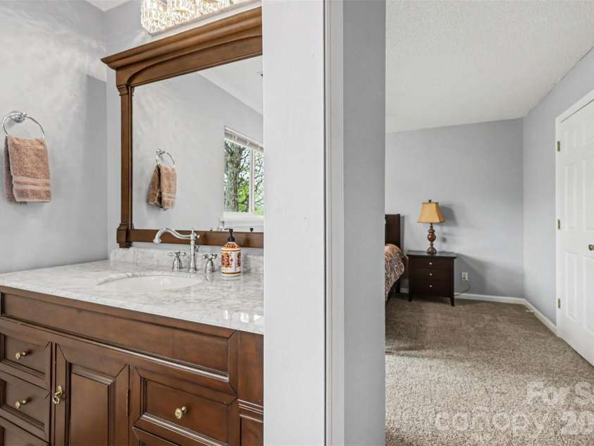 26030 Misty Way Drive, Tega Cay, SC 29708.  MLS# CAR4362203, YatesRealty ID 19693. Remodeled Spare Bathroom