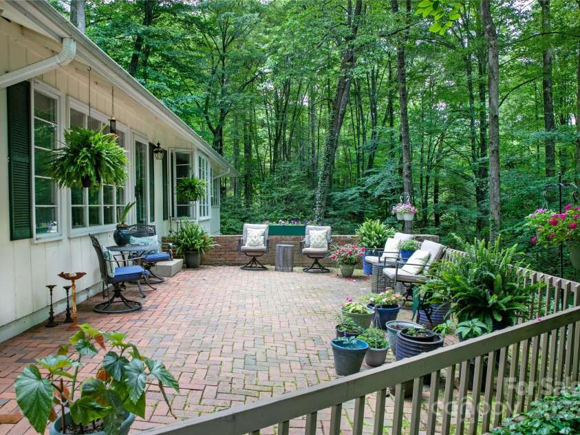 168 River Ridge Road, Brevard, NC 28712.  MLS# CAR4260361, YatesRealty ID 19694. Private patio