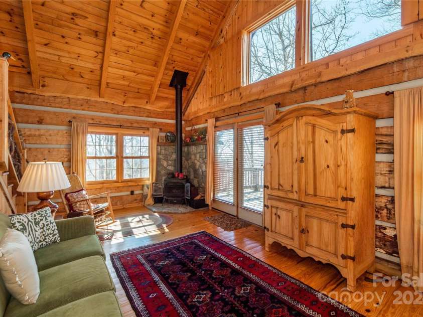 1074 Indian Camp Mountain Road, Rosman, NC 28772.  MLS# CAR4109820, YatesRealty ID 1970. Guest cabin living area