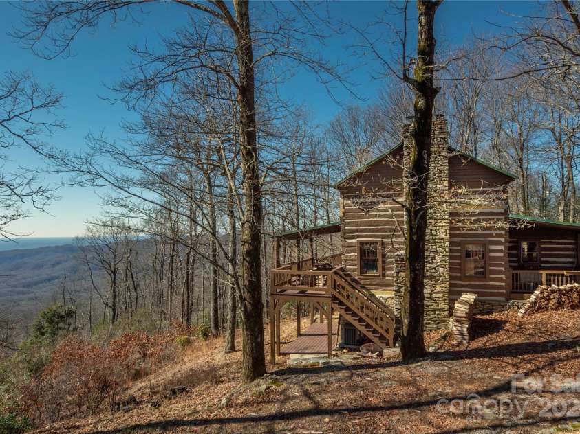 1074 Indian Camp Mountain Road, Rosman, NC 28772.  MLS# CAR4109820, YatesRealty ID 1970. Main cabin side view