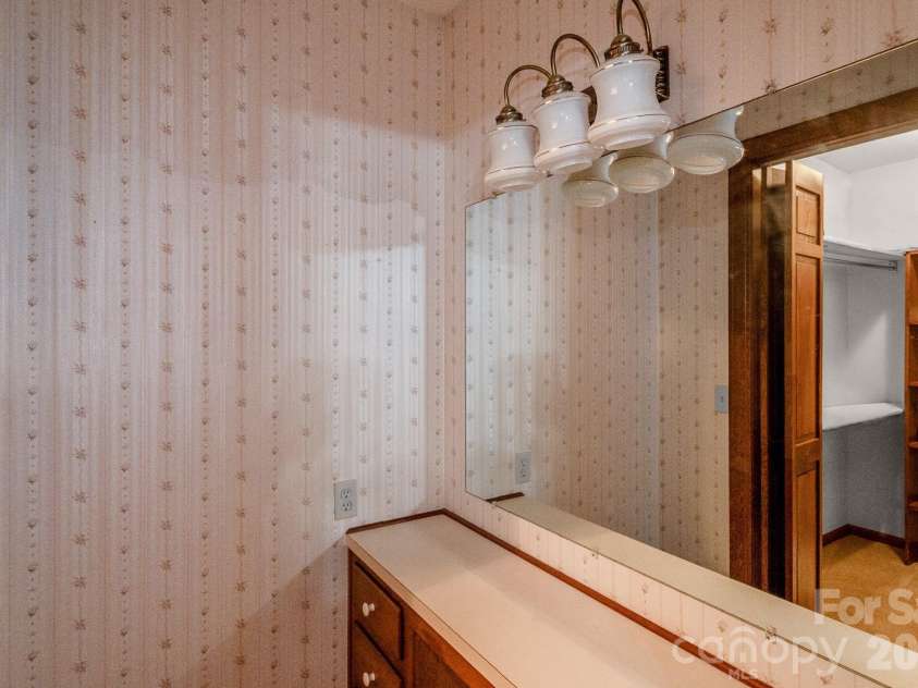 304 West Street, Kershaw, SC 29067.  MLS# CAR4328662, YatesRealty ID 1970. Upper level bedroom with dressing area
