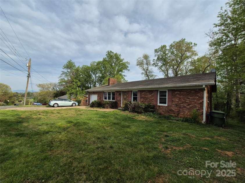 64 Round Top Road, Asheville, NC 28803.  MLS# CAR4248963, YatesRealty ID 19703. Front