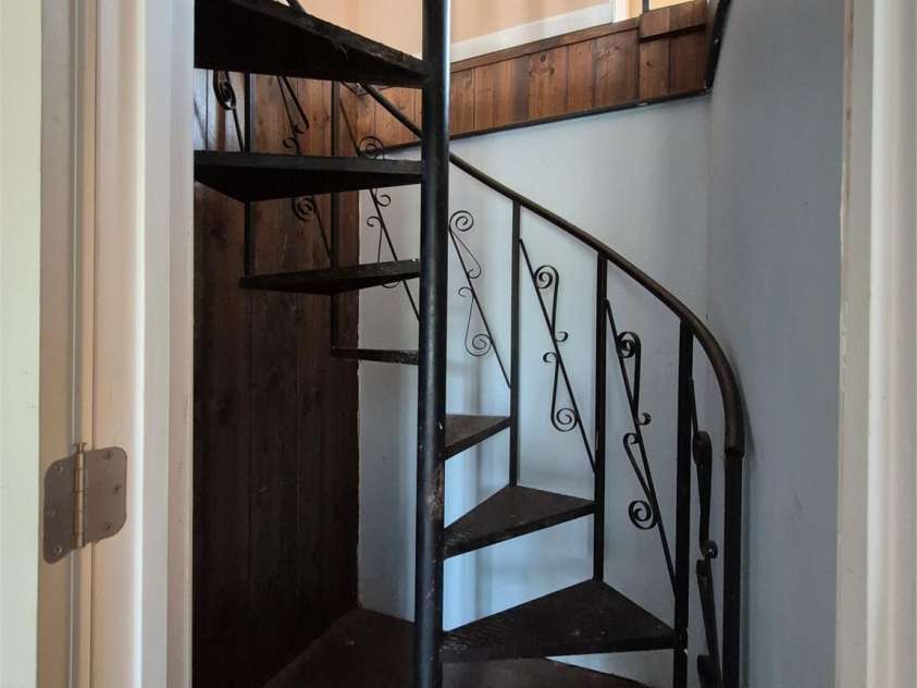 64 Round Top Road, Asheville, NC 28803.  MLS# CAR4248963, YatesRealty ID 19703. Spiral stairs