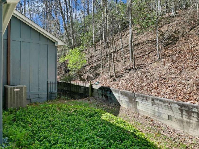 207 Aberdeen Lane, Pisgah Forest, NC 28768.  MLS# CAR4249386, YatesRealty ID 19704. Back Yard