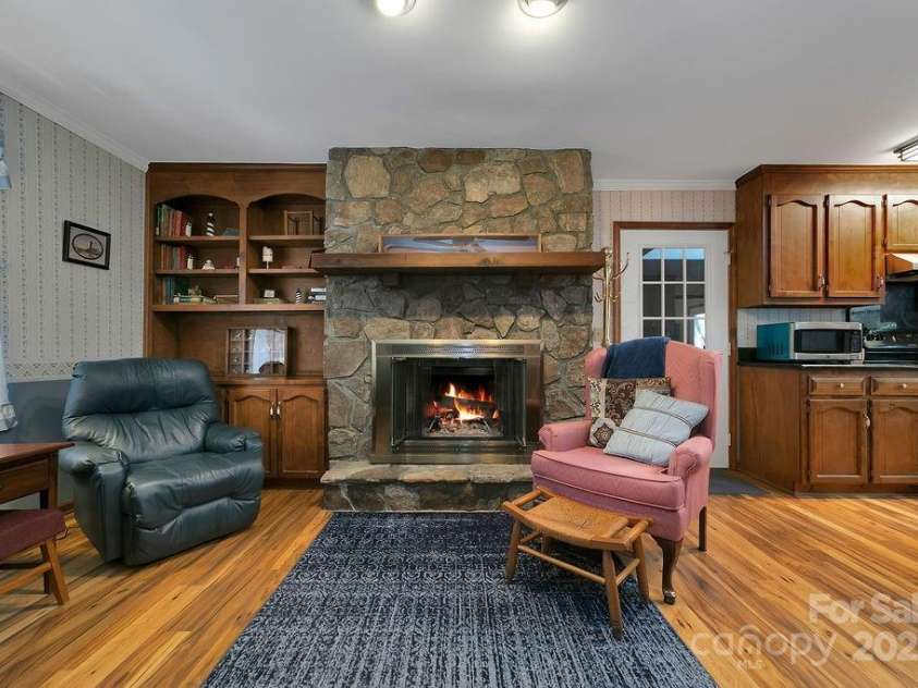 207 Aberdeen Lane, Pisgah Forest, NC 28768.  MLS# CAR4249386, YatesRealty ID 19704. Beautiful Stone Fireplace