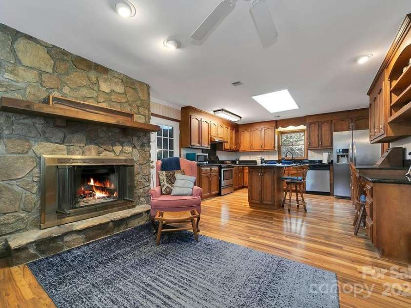 207 Aberdeen Lane, Pisgah Forest, NC 28768.  MLS# CAR4249386, YatesRealty ID 19704. Den to Kitchen