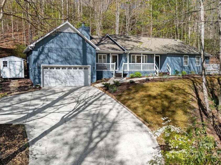 207 Aberdeen Lane, Pisgah Forest, NC 28768.  MLS# CAR4249386, YatesRealty ID 19704. Well Maintained Home/Storage building does not convey.