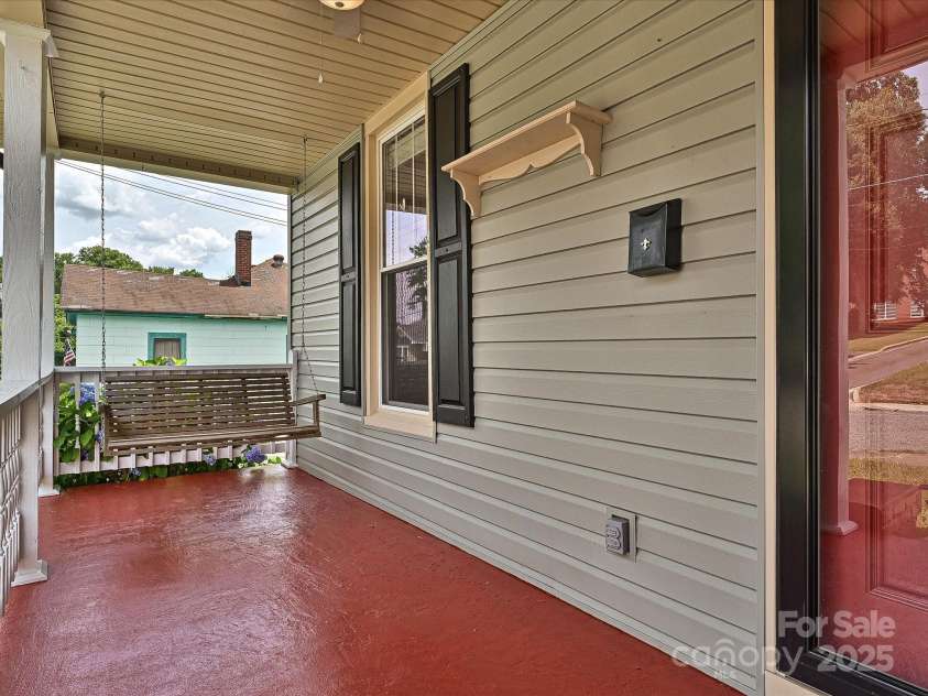 214 Tenth Street, Cramerton, NC 28032.  MLS# CAR4269315, YatesRealty ID 19708. Relax with a beverage