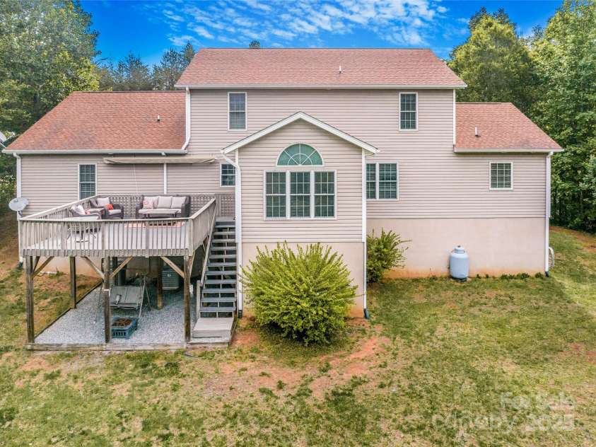 121 Ashe Bridge Road, Marion, NC 28752.  MLS# CAR4256500, YatesRealty ID 19710. Back of house.