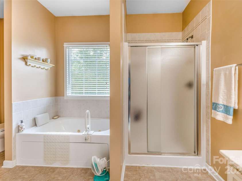 121 Ashe Bridge Road, Marion, NC 28752.  MLS# CAR4256500, YatesRealty ID 19710. Primary bathroom