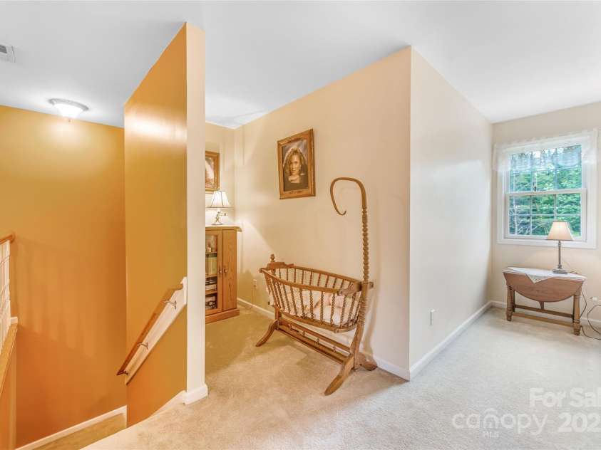 121 Ashe Bridge Road, Marion, NC 28752.  MLS# CAR4256500, YatesRealty ID 19710. Top of the stairs there is a nice landing space