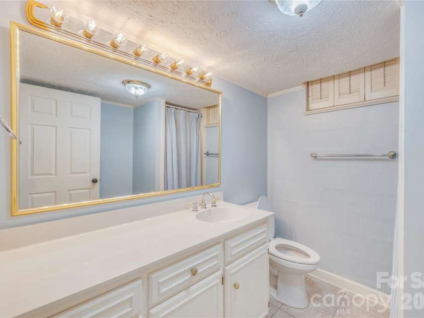 111 Kinwood Street, Morganton, NC 28655.  MLS# CAR4331530, YatesRealty ID 19711. Lower Level bath