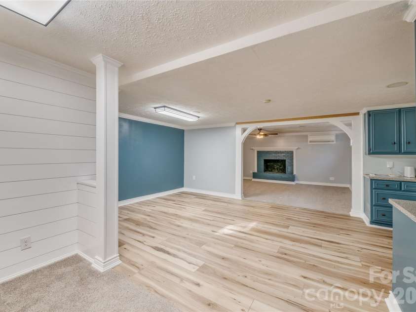 111 Kinwood Street, Morganton, NC 28655.  MLS# CAR4331530, YatesRealty ID 19711. Lower level/basement living, dining, and kitchen space.