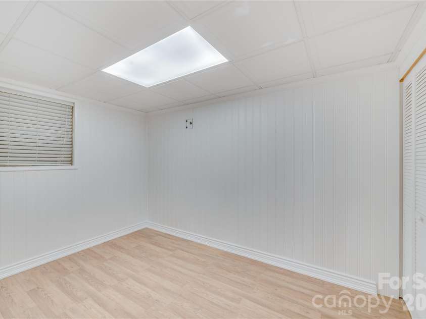 111 Kinwood Street, Morganton, NC 28655.  MLS# CAR4331530, YatesRealty ID 19711. Office/ 4th bedroom in the lower/ basement.