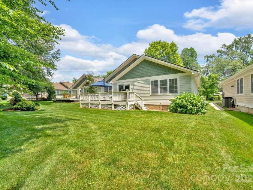 145 Fairway View Drive, Etowah, NC 28729.  MLS# CAR4267216, YatesRealty ID 19711. Backyard perfect for entertaining