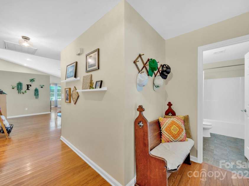145 Fairway View Drive, Etowah, NC 28729.  MLS# CAR4267216, YatesRealty ID 19711. Entryway (hall bath to the right) - guest bedroom on the right as well