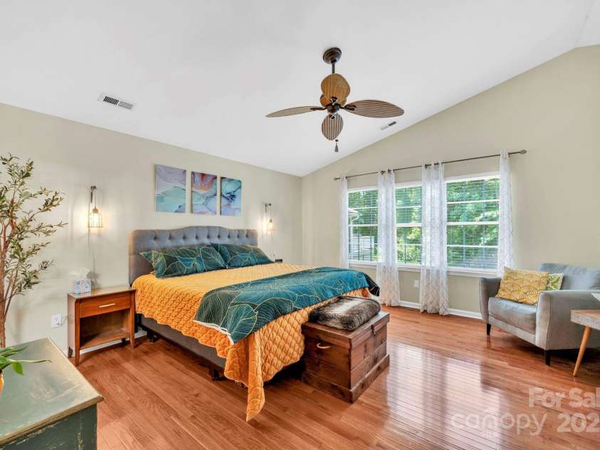 145 Fairway View Drive, Etowah, NC 28729.  MLS# CAR4267216, YatesRealty ID 19711. Huge primary bedroom, vaulted ceilings too!