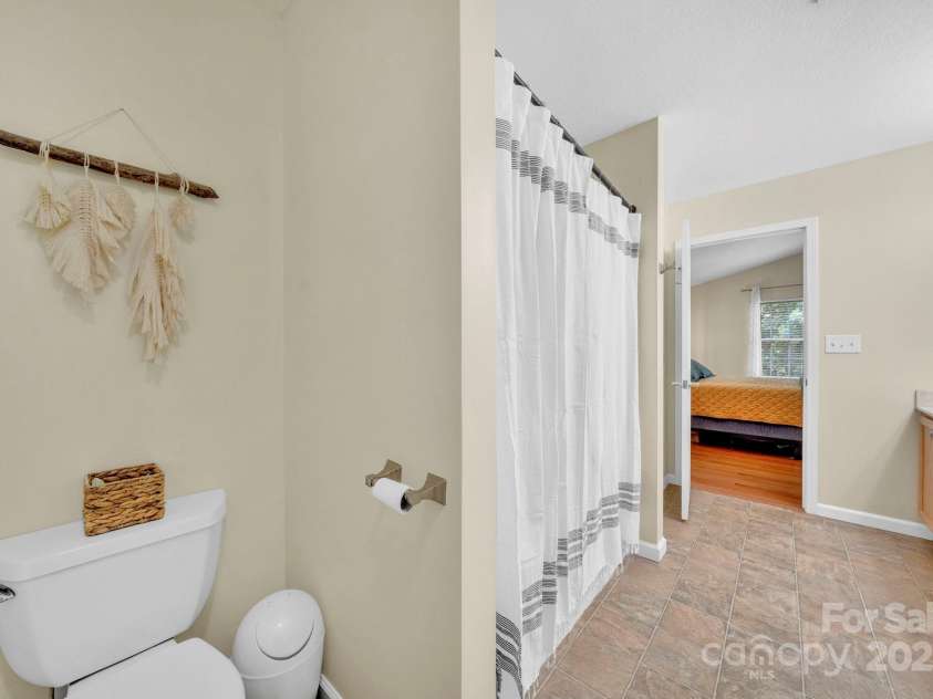 145 Fairway View Drive, Etowah, NC 28729.  MLS# CAR4267216, YatesRealty ID 19711. Primary bathroom (en-suite)
