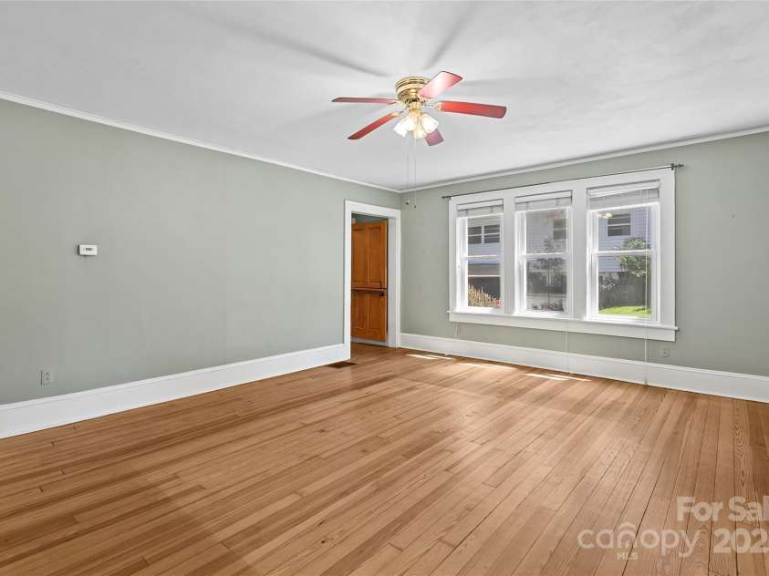 80 Laurel Avenue, Tryon, NC 28782.  MLS# CAR4299418, YatesRealty ID 1972. Another angle of the living room.