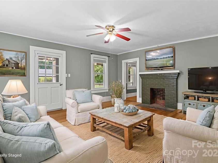 80 Laurel Avenue, Tryon, NC 28782.  MLS# CAR4299418, YatesRealty ID 1972. Living room -virtual staging.