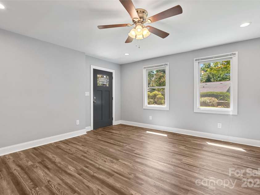 80 Laurel Avenue, Tryon, NC 28782.  MLS# CAR4299418, YatesRealty ID 1972. Studio Apartment has its own entrance and also a double lock door to the main house living spaces.