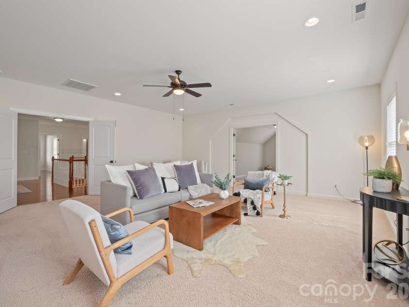 10620 Euclid Avenue, Concord, NC 28027.  MLS# CAR4354098, YatesRealty ID 19722. Large bonus room with ample space for entertaining