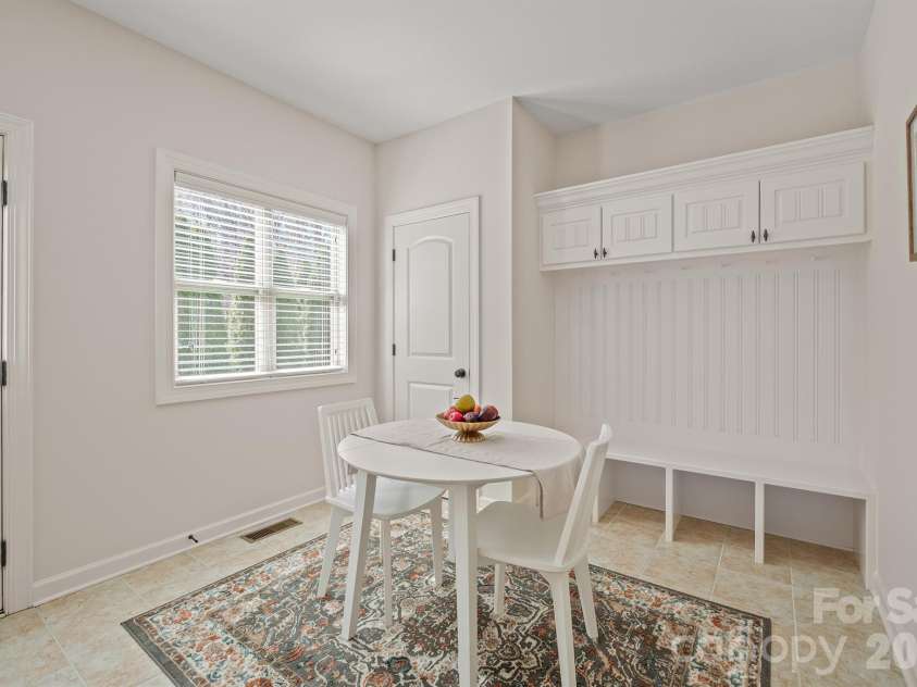 10620 Euclid Avenue, Concord, NC 28027.  MLS# CAR4354098, YatesRealty ID 19722. Laundry room with buit-in drop zone and ample space for craft area, homework, etc..