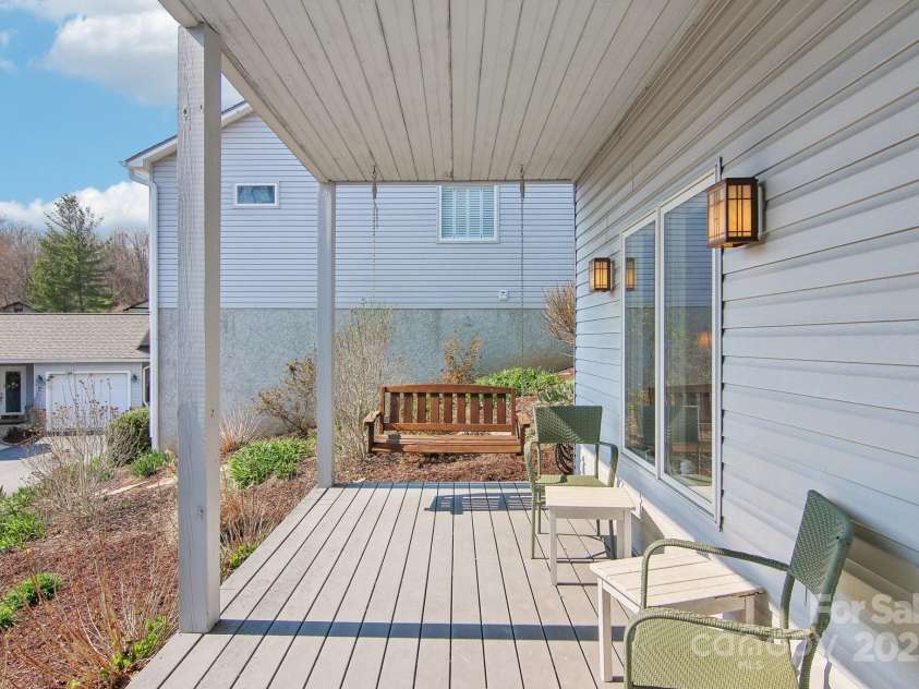 80 Laurel Ridge Place, Hendersonville, NC 28739.  MLS# CAR4238282, YatesRealty ID 19722. Sweet covered back porch just off of lower level family room