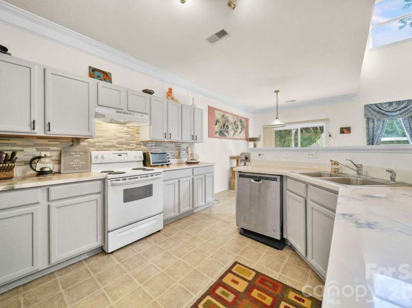 2056 Moss Creek Drive, Harrisburg, NC 28075.  MLS# CAR4374331, YatesRealty ID 19725. 