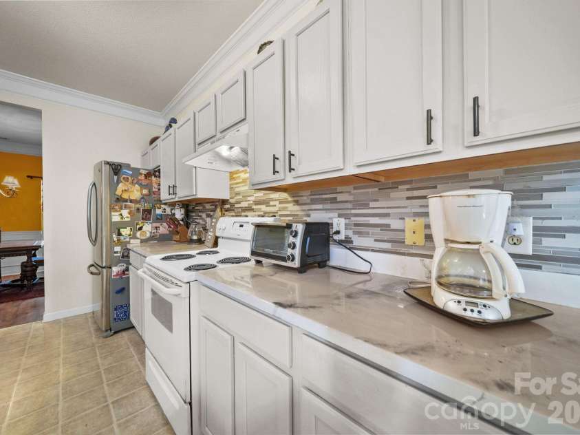 2056 Moss Creek Drive, Harrisburg, NC 28075.  MLS# CAR4374331, YatesRealty ID 19725. 