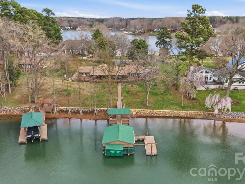 236 Apache Road, Troutman, NC 28166.  MLS# CAR4359171, YatesRealty ID 19726. Aerial looking at covered dock with 2 slips.
