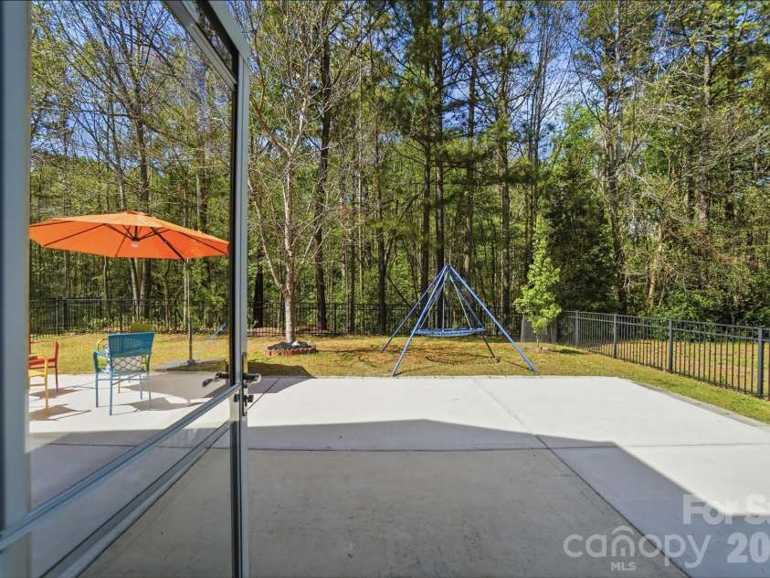 2153 Bluebell Way, Tega Cay, SC 29708.  MLS# CAR4363780, YatesRealty ID 19727. Back Patio