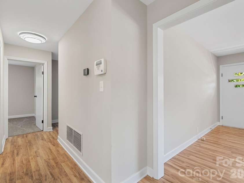 19 Browndale Road, Asheville, NC 28805.  MLS# CAR4338524, YatesRealty ID 19731. Hallway and living room